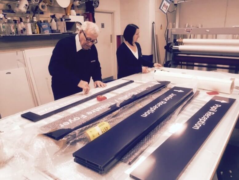 Man Wrapping Signages